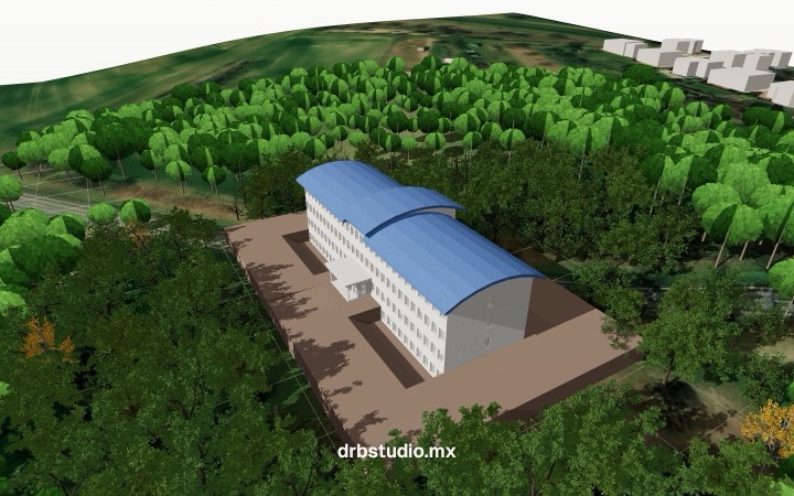 Four-story office building with a blue roof among trees